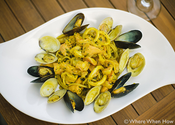 A photograph of  Homemade Tagliolini with Seafood at Caicos Café on Governors Road, Providenciales (Provo), Turks and Caicos Islands.