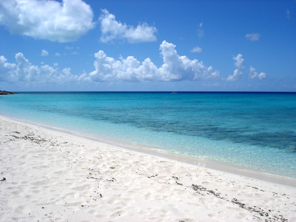 A photograph of beautiful, deserted beach on Providenciales (Provo), Turks and Caicos Islands, British West Indies