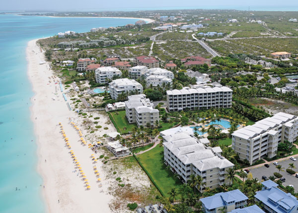 A photograph of Flying over the resorts on Grace Bay in Turks and Caicos Islands