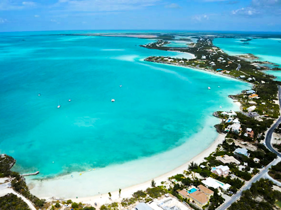 An aerial photograph of Sapodilla Bay Beach, Providenciales (Provo), Turks and Caicos Islands, British West Indies