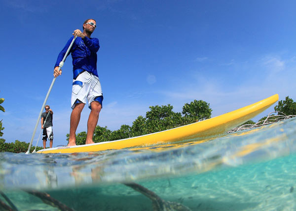 A photograph of Stand-up Paddle Boarding with Big Blue Collective, Providenciales (Provo), Turks and Caicos Islands